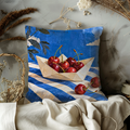 Cherry Filled Paper Boat Pillow Cover | Striped Cloth Against a Painted Blue Sky with Clouds and Dark Foliage